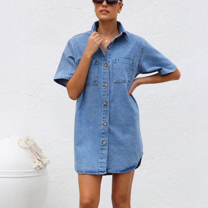 Women’s denim shirt dress with short sleeves and practical pockets