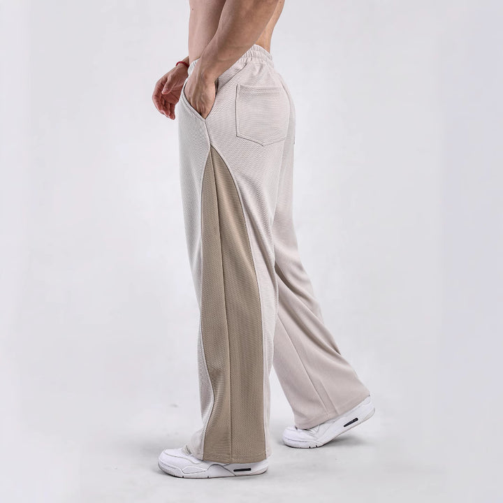 Men's sporty leisure pants with side ventilation openings and elastic waistband Lisslune