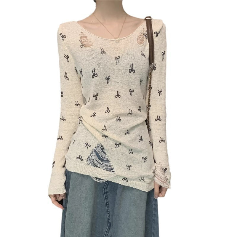 Women's long sleeve shirt with stylish rips and playful motif Lisslune