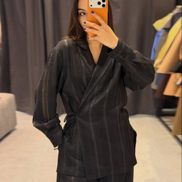 Women's set of stylish oversized blazer and wide-cut trousers