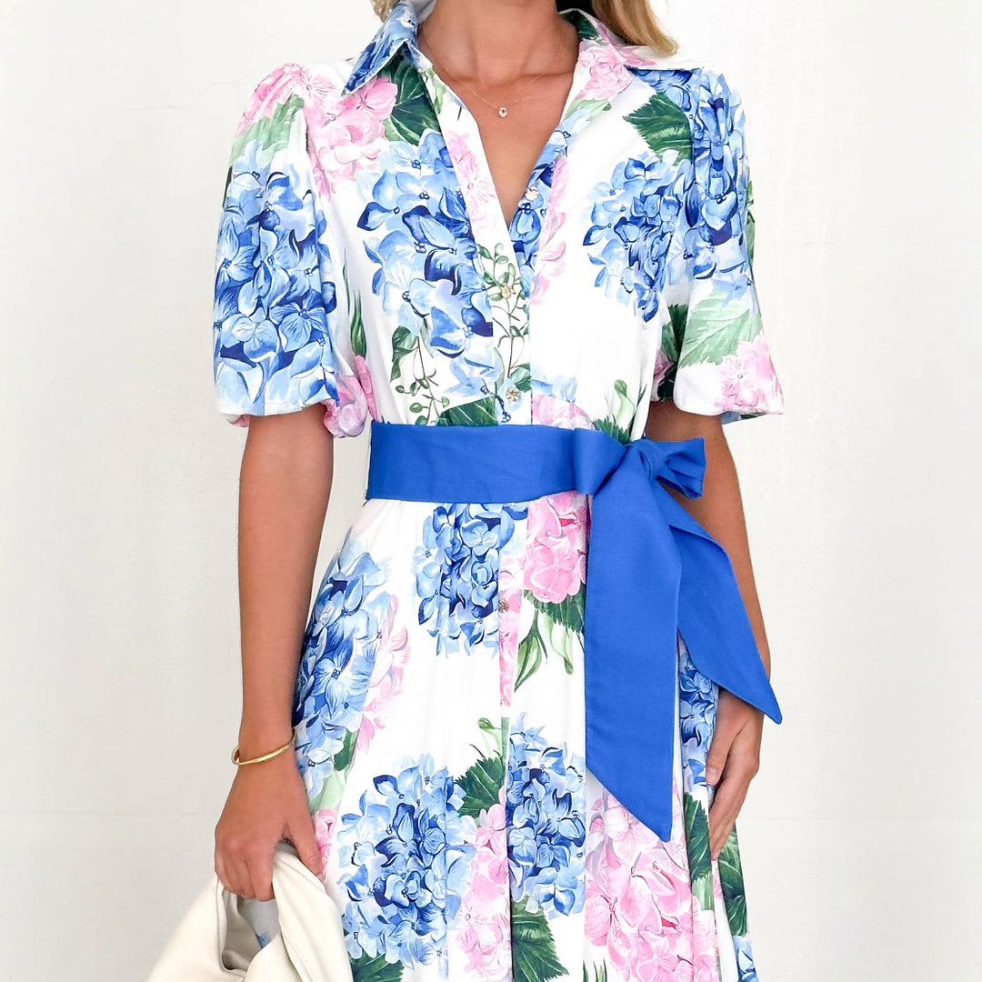 Women's maxi dress with pleats and waist belt