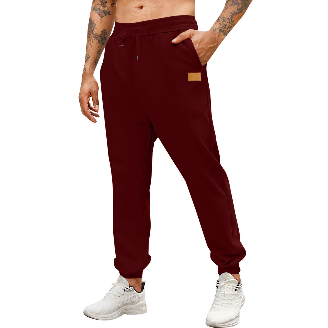 Men's sporty jogging pants with side zippered pockets and adjustable waistband Lisslune