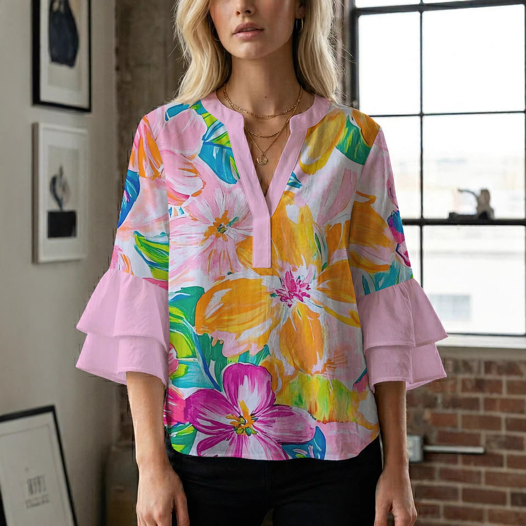 Women’s blouse with voluminous ruffled sleeves and floral pattern Lisslune