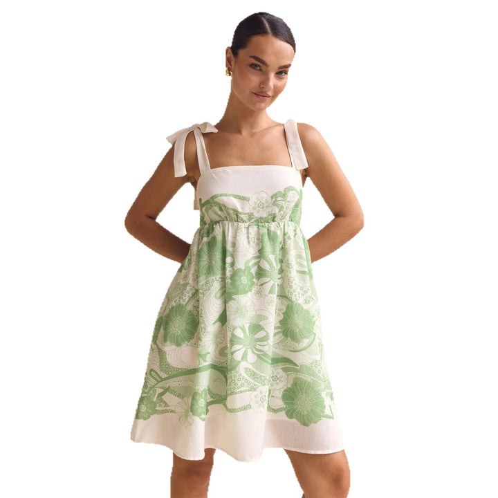 Women's summery mini dress with playful pattern mix and flowy cut Lune London