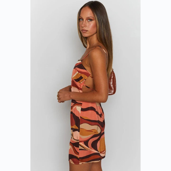 Ladies mini dress with seductive wrap design and intense color gradient Lune London