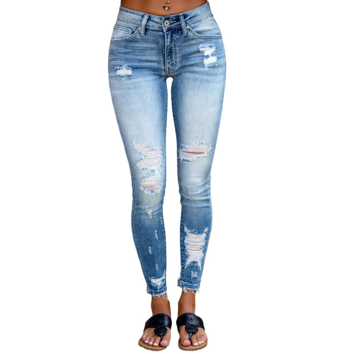 Women's skinny jeans in trendy destroyed look with high waistband and fringed hem