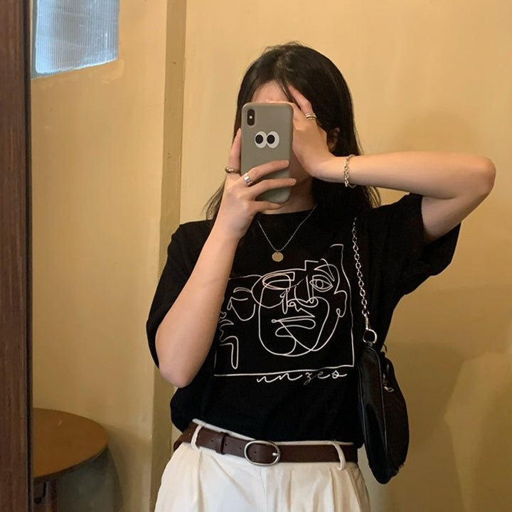 Women's graphic t-shirt with modern line art design and casual fit