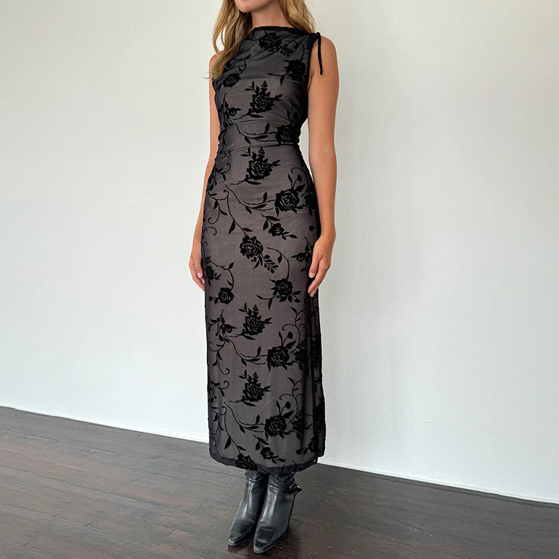 Women’s maxi dress with floral lace detailing and figure-hugging silhouette