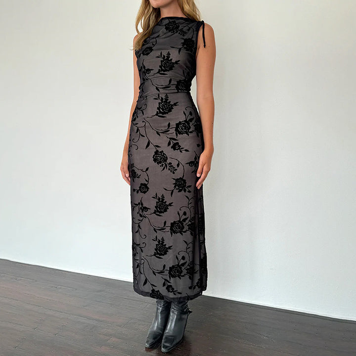 Women’s maxi dress with floral lace detailing and figure-hugging silhouette