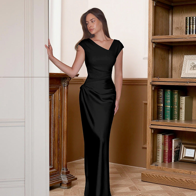 Women's elegant evening dress made of flowing material with asymmetric design