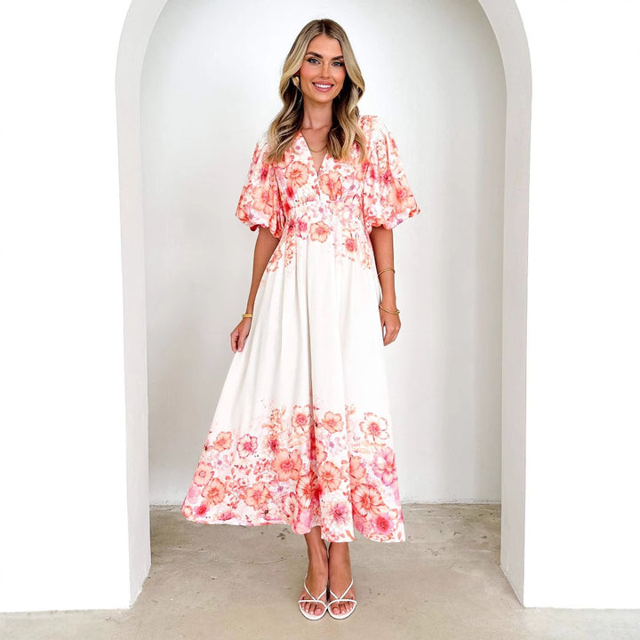 Women's maxi dress with voluminous puff sleeves and flowing cut