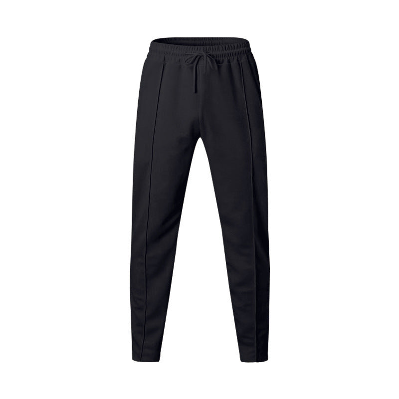 Men's sporty jogging pants with elastic waistband and side inserts Lisslune