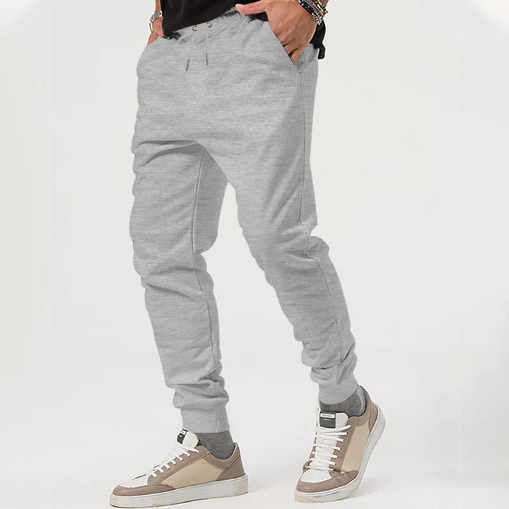 Men's casual jogging pants with elastic waistband and side zip pockets Lisslune