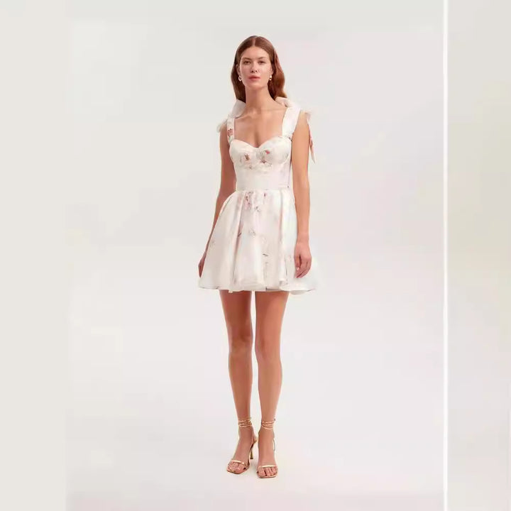 Women's Playful Mini Dress with Floral Design and Sophisticated Straps