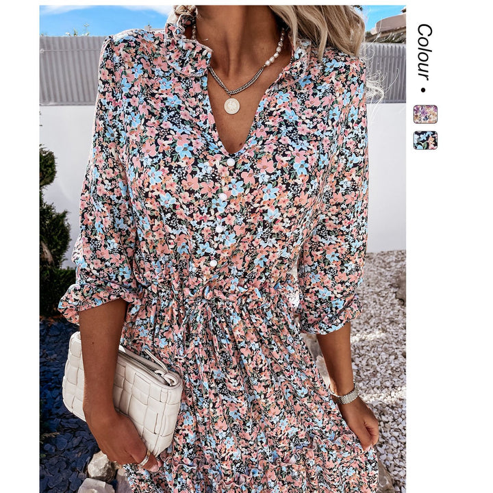 Women's floral dress with playful ruffle details and knee-length cut