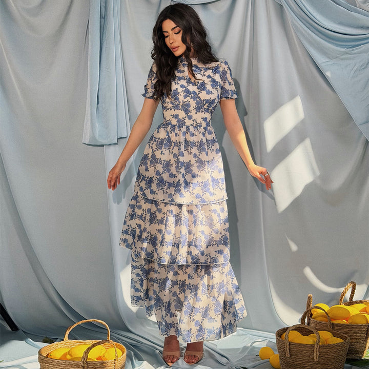 Ladies floral dress with stylish stand-up collar and translucent sleeves