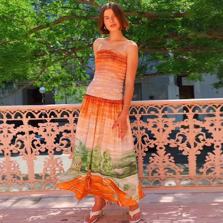Women's maxi wrap dress with elastic top and flowing skirt