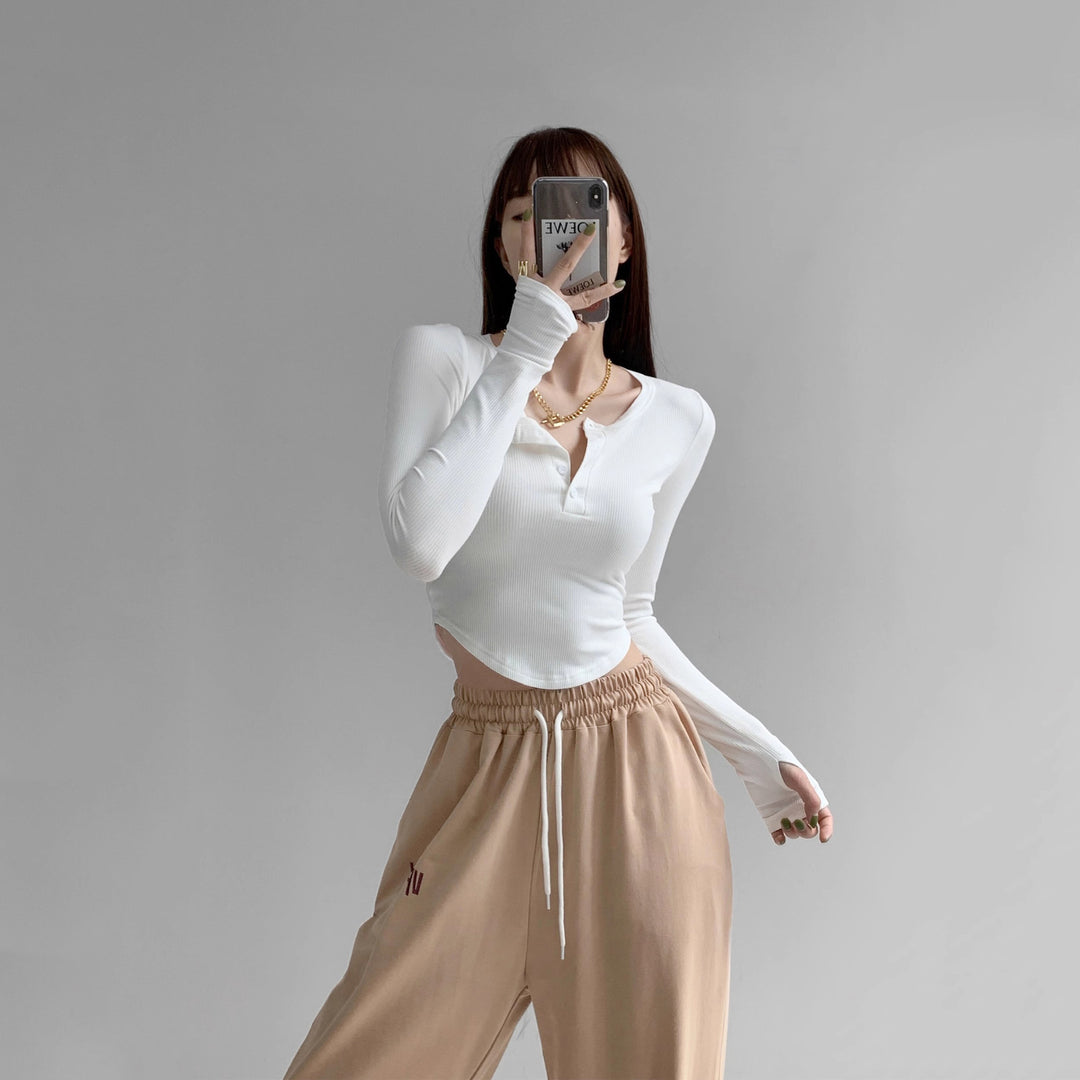 Women's long sleeve shirt with decorative button design and casual fit