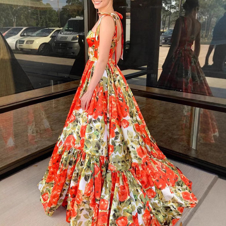 Ladies festive maxi dress with floral ruffle details and swinging skirt