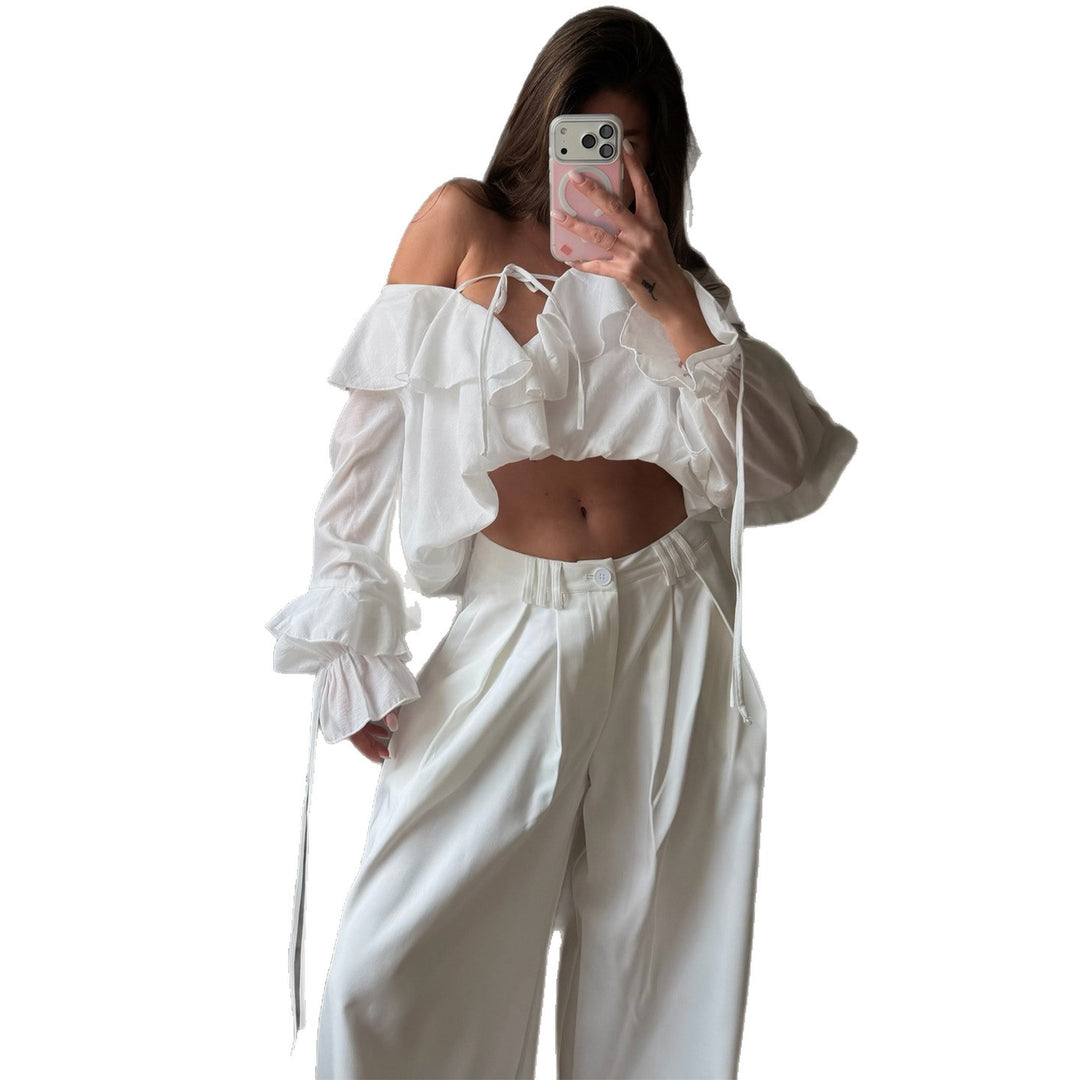 Women's blouse with voluminous ruffle details and captain sleeves