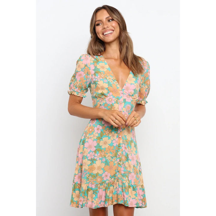 Ladies mini dress in romantic garden style with voluminous sleeves and playful hem