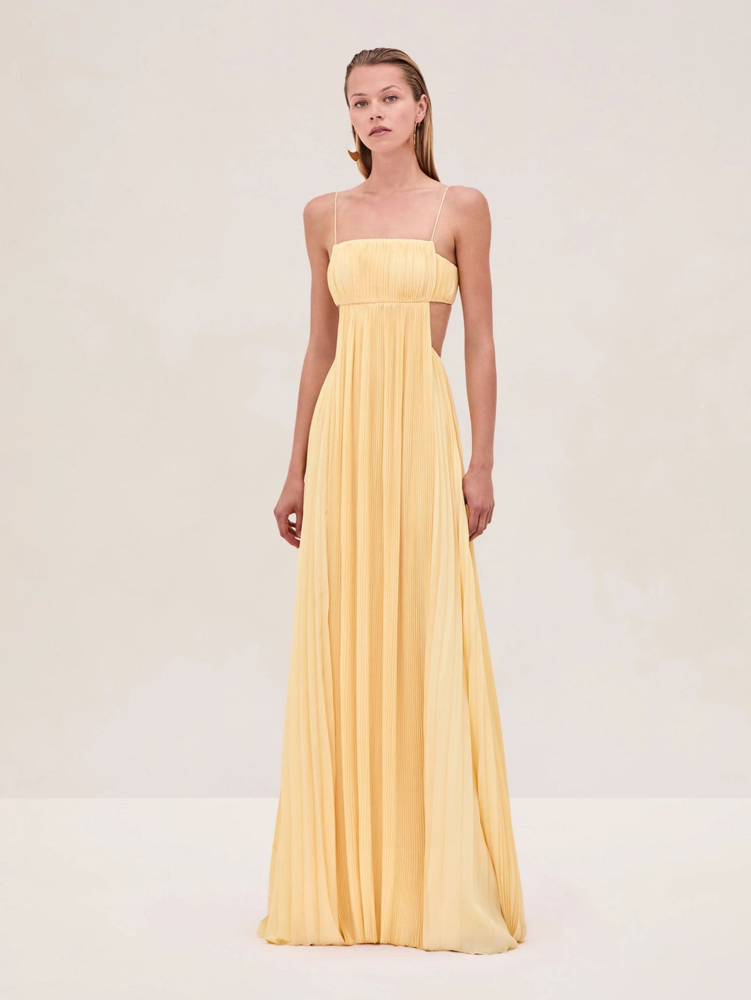 Women's maxi dress with elegant pleated details and thin spaghetti straps