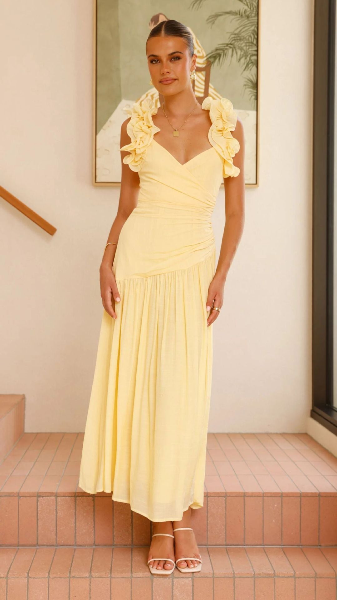 Ladies maxi dress with elegant ruffles and figure-hugging cut