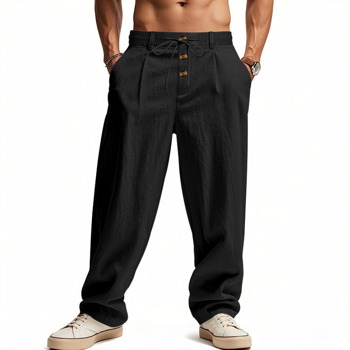 Men's casual loose-fitting leisure pants with elastic waistband and functional button details Lisslune