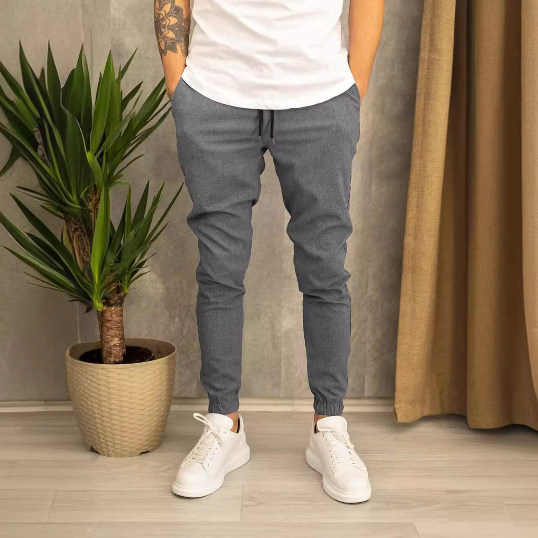 Men's Slim-Fit Jogging Pants with Elastic Waistband and Practical Side Flap Pockets Lisslune