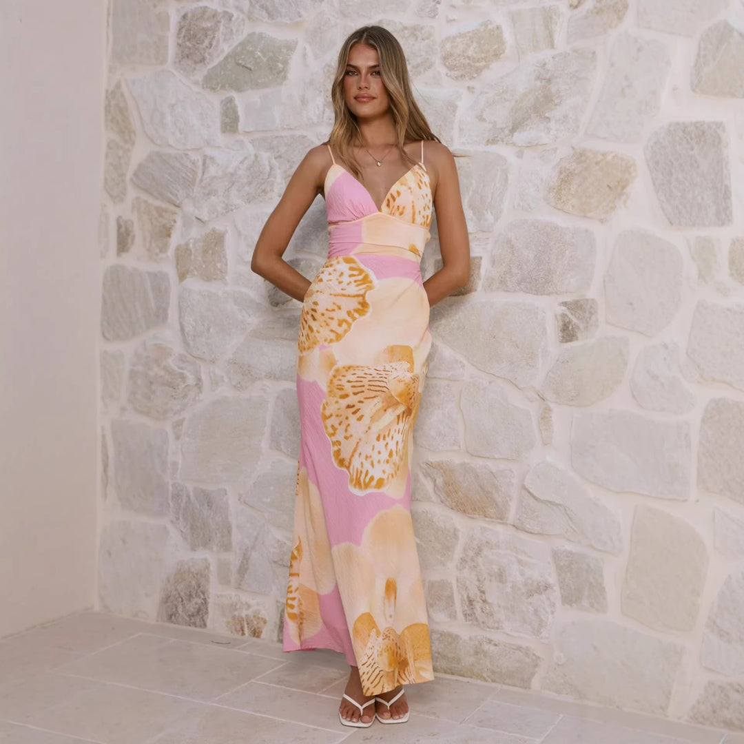 Women's maxi dress with floral design and refined ruffle details