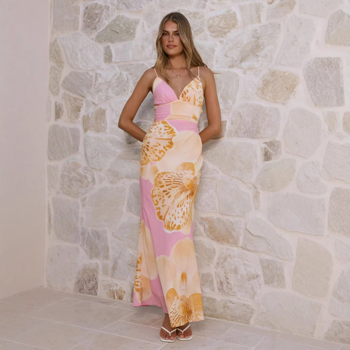 Women's maxi dress with floral design and refined ruffle details