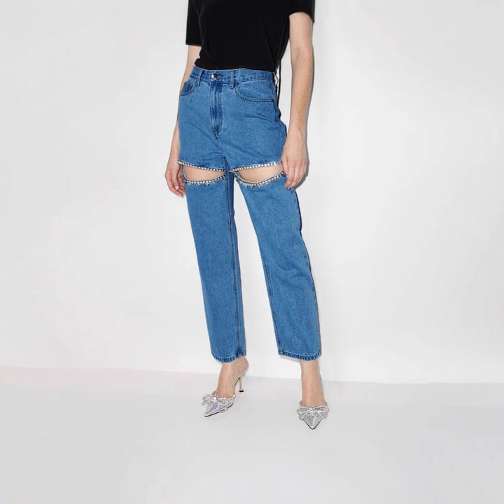 Ladies jeans with an extravagant cut-out design and glittering embellishments