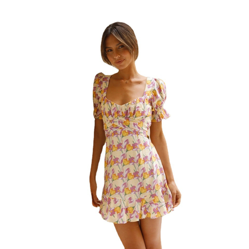 Women's mini dress with voluminous sleeves and playful ruffled hem