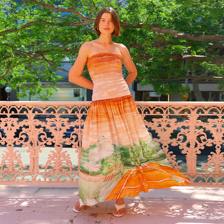 Women's maxi wrap dress with elastic top and flowing skirt