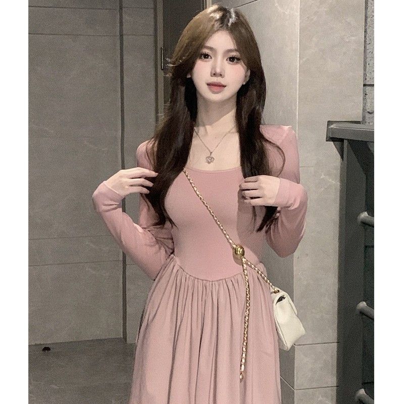 Women long-sleeved midi dress with flared skirt and decorative puff sleeves