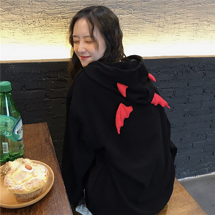 Women's oversized hoodie with playful wing appliqués Lisslune