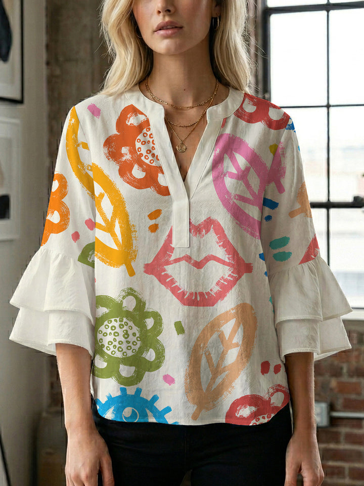 Women’s blouse with voluminous ruffled sleeves and floral pattern Lisslune