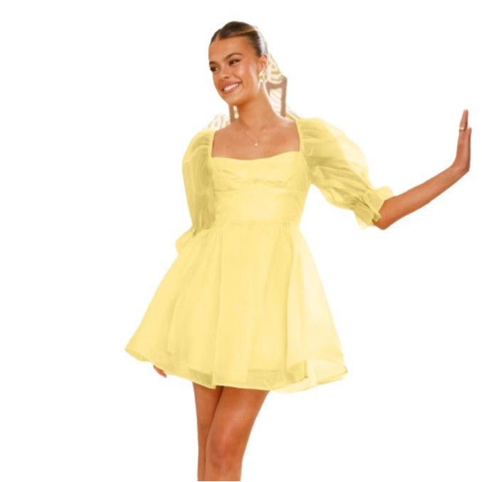 Women's mini dress with voluminous puff sleeves and sweetheart neckline