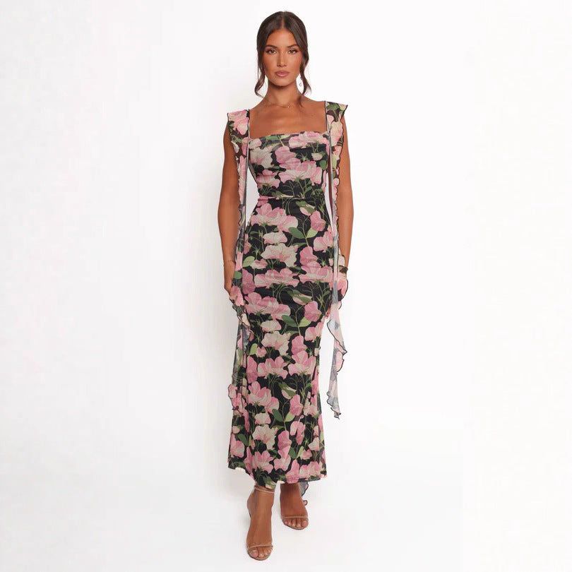 Ladies pencil dress with romantic floral design and ruffled sleeves Lune London