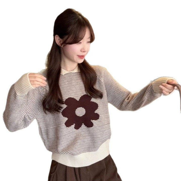 Women's striped sweater with floral appliqué and casual cut