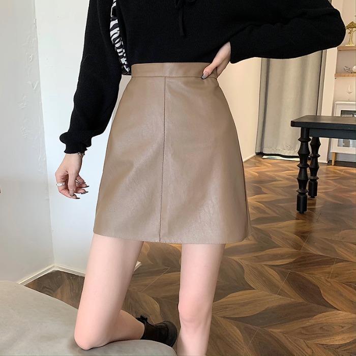 Ladies pencil skirt made of high-quality faux leather with contemporary cut