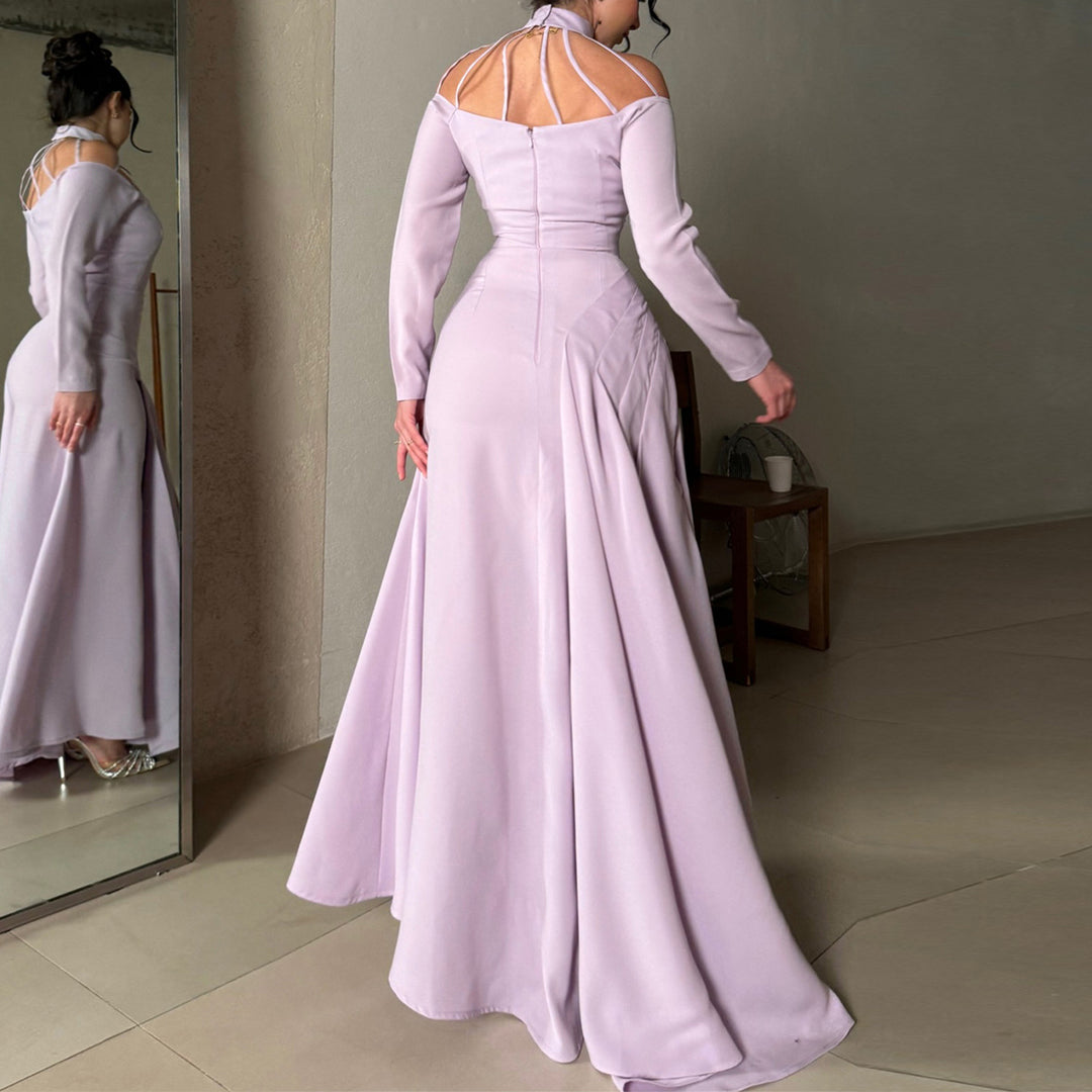 Ladies elegant evening dress with strategic cut-outs and flowing skirt