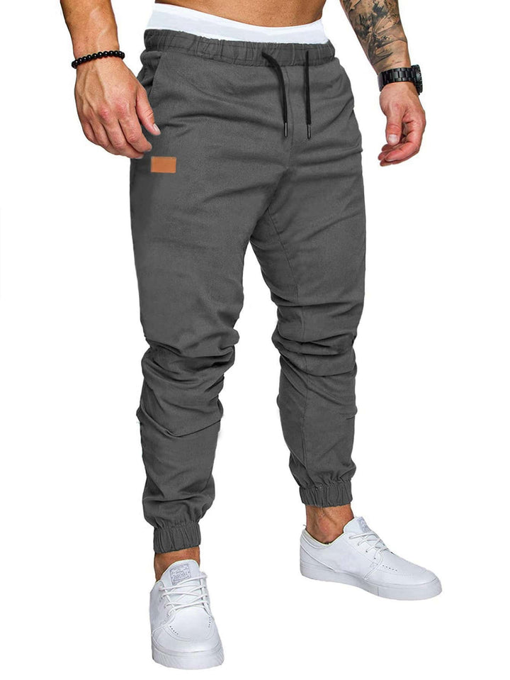 Men's casual jogging pants with elastic waistband and practical zip pockets Lisslune