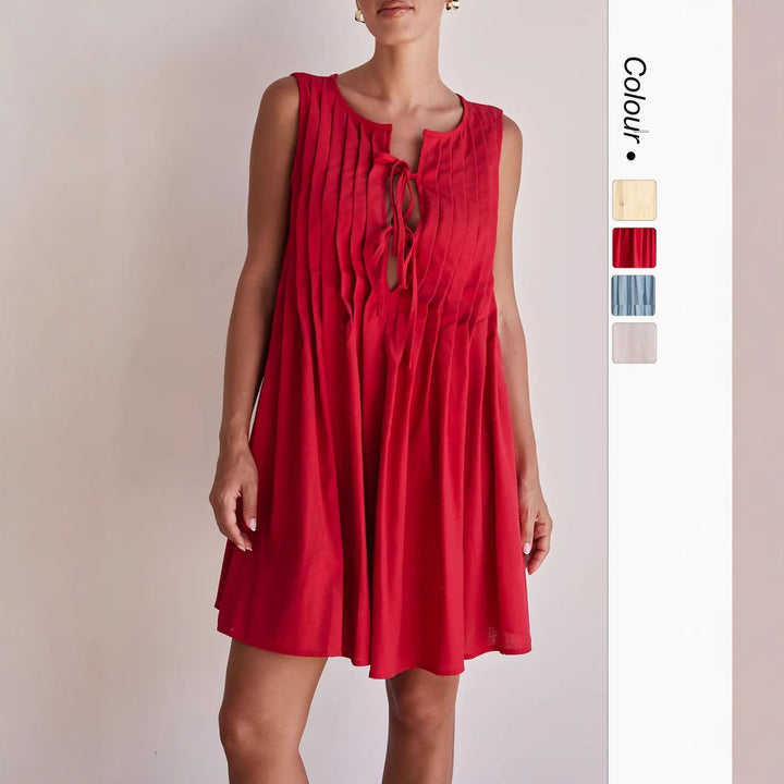 Ladies A-line dress with playful knot and refined pleats Lune London