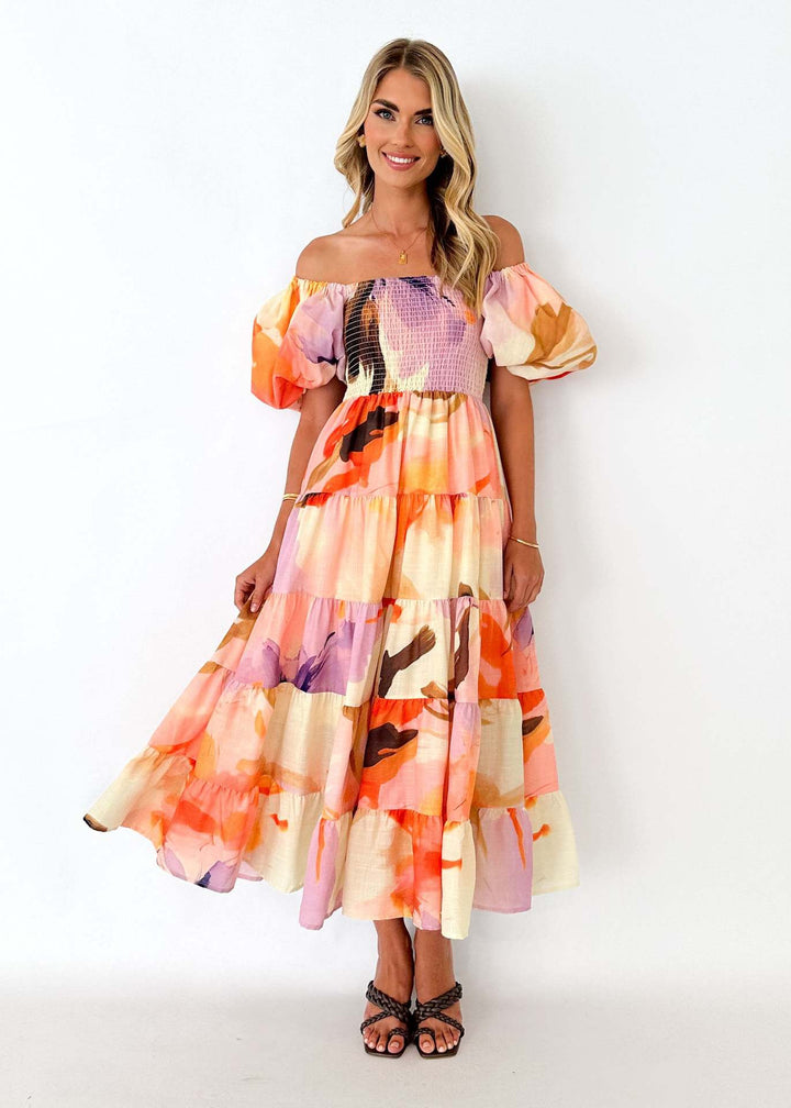 Women's maxi dress with puff sleeves and floral smocking