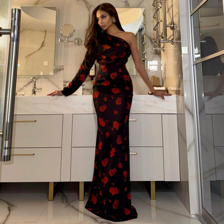 Women’s maxi dress with asymmetric design and elegant floral pattern