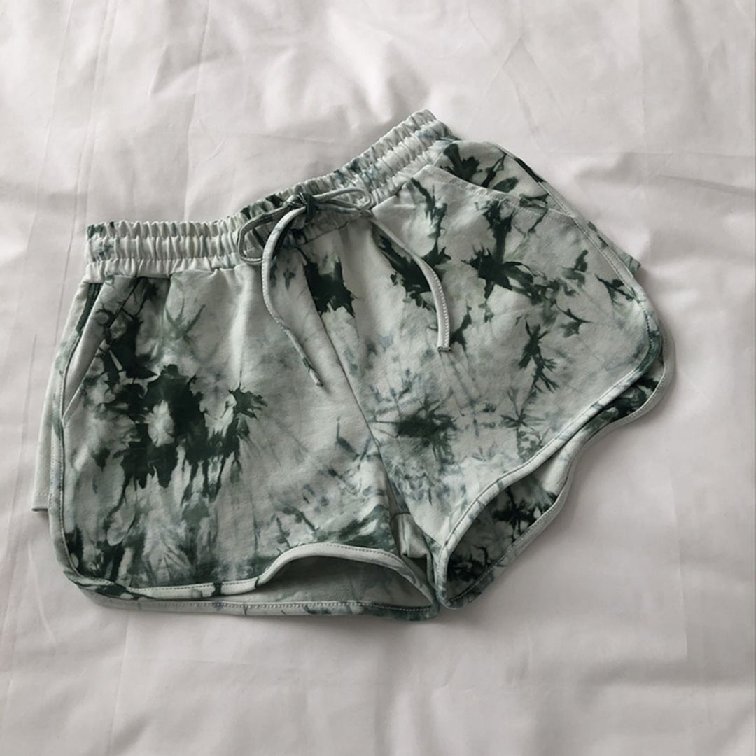 Women’s casual sweat shorts with trendy tie-dye design and practical side pockets