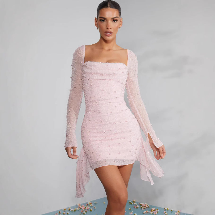 Ladies functional dress with sophisticated draping and delicate pearl embellishment
