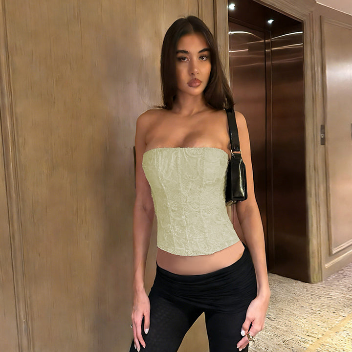 Women's corset top with intricate lace pattern and tailored fit