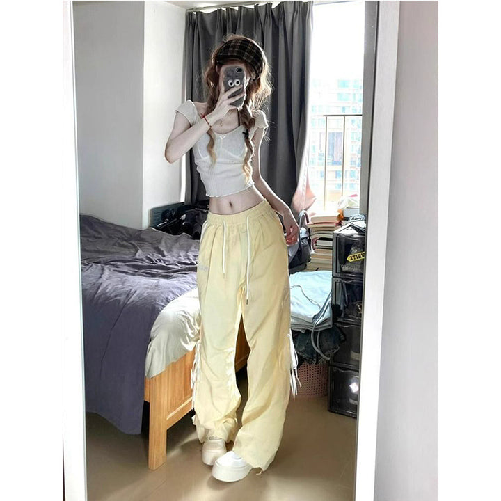 Women’s casual sports pants with side stripes and comfortable drawstring waistband